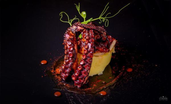 Pulpo braseado con patata y aceite de oliva